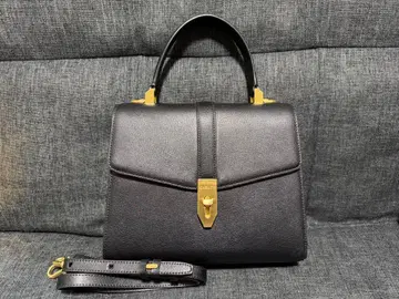 CARLYN 블랙 가죽 핸드백