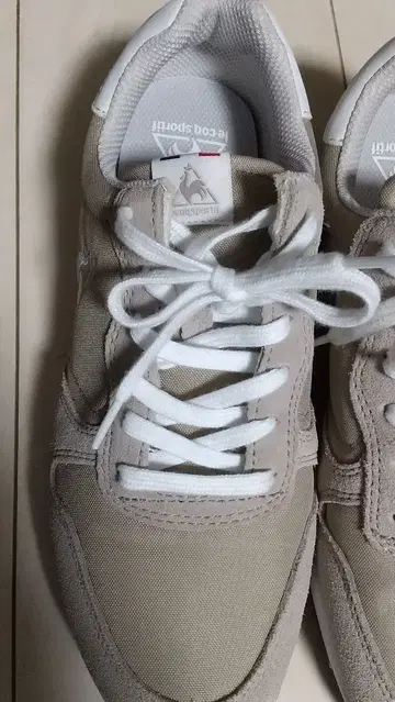 르꼬끄 스포르티브 베이지 스니커즈