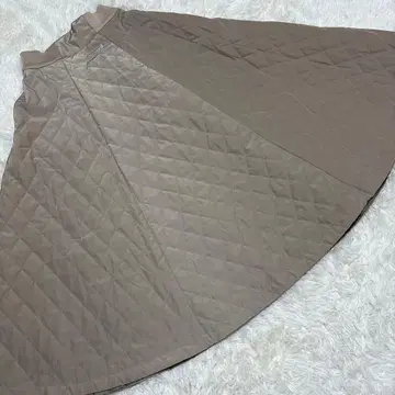 CYNICAL 퀼팅 플레어 롱 스커트 베이지 2