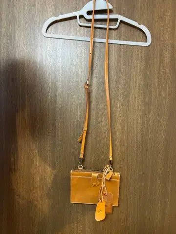 오렌지 숄더백 사코슈 fes