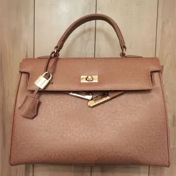 새상품급 브라운 가죽 핸드백 HENRY SMITH 카나데