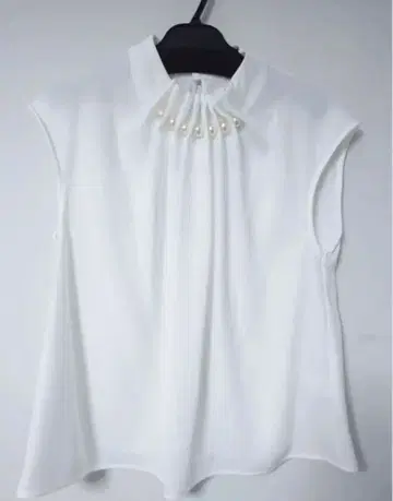 Noela 슬리브리스 상의