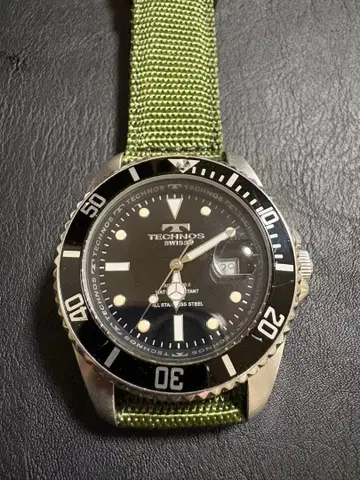 회전 베젤 TECHNOS 블랙 다이얼 TAM629