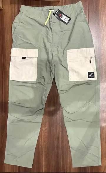 New Balance MP11580 팬츠