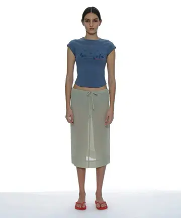 PARTIMENTO WOMEN 시어 미디 스커트 라이트 그린