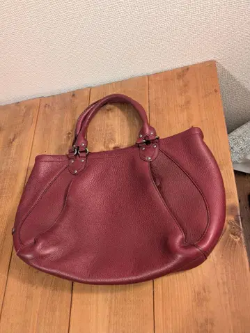 콜한 버건디 핸드백 포켓 부착