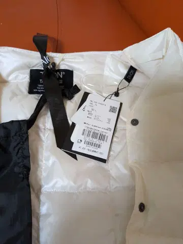 TAION 아이보리 다운 베스트 수납 봉투 포함