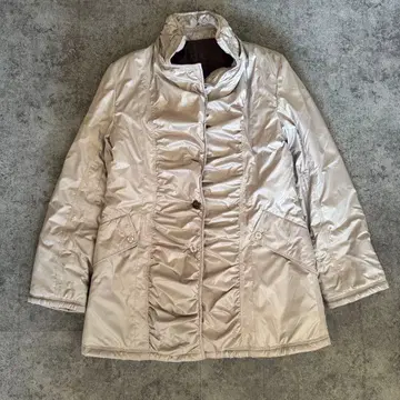 베이지 프릴 충전솜 다운 자켓