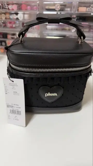 pium 블랙 숄더백