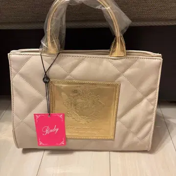 Rady 베이지 퀼팅 핸드백