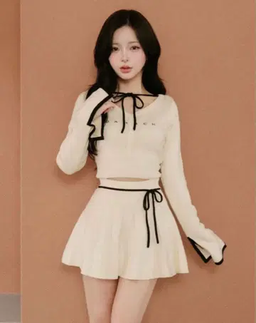 darich 허리 오픈 리본 디자인 니트 미니 원피스