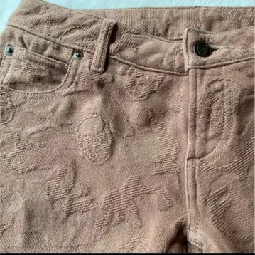 루시앙페라피네 스컬 원단 패턴 팬츠