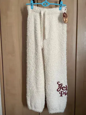 스노우베어 HOLIDAY 롱팬츠 택 포함 아이보리 여성 사이즈