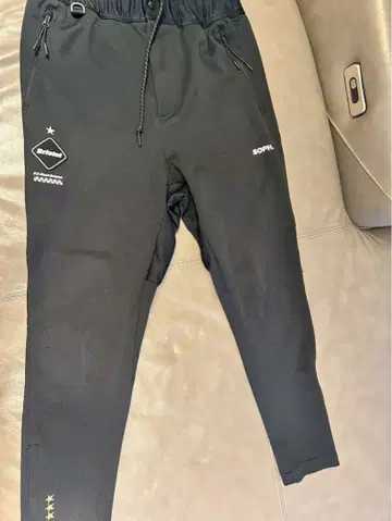 블랙 사루엘 조거 팬츠 SOPH.
