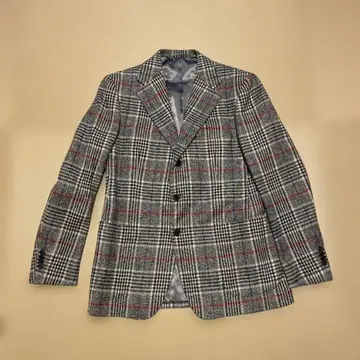 체크 무늬 테일러드 자켓