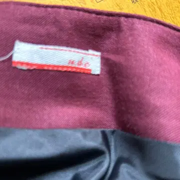 ndc 체크 무늬 무릎 기장 스커트