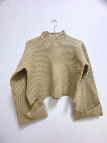 Ambre Neige 베이지 리브 스웨터