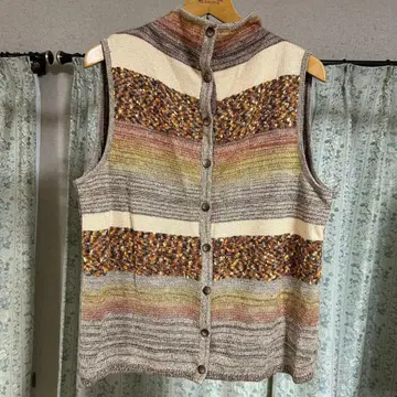 릴리안느 뷔르티 파리 니트 베스트