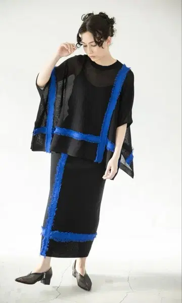 OSMOSIS 프린지 테이프 니트 스커트