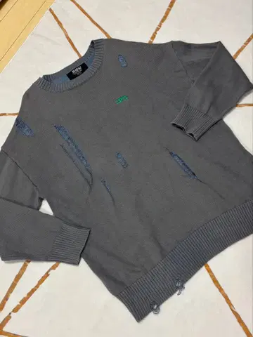 JEANASIS 죠죠의 기묘한 모험 스톤 오션 데미지 니트