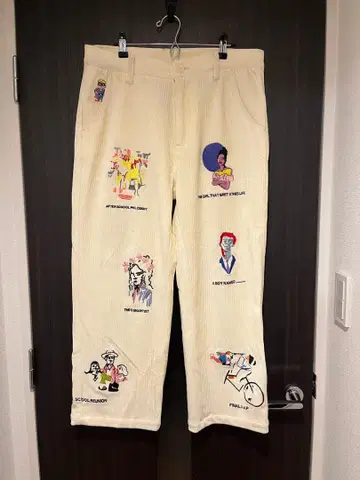 KIDSUPER MUSEUM EMBROIDERED CORD PANTS