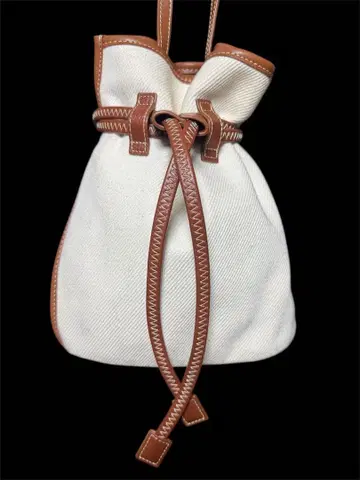 The dilettante 코튼 캔버스 x 가죽 미니백