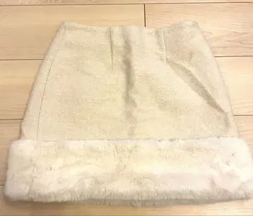 Her lip to Monceau Boucle Mini Skirt