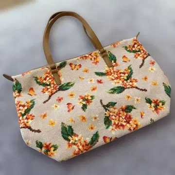 한 번만 사용한 페이러 미모사 토트백