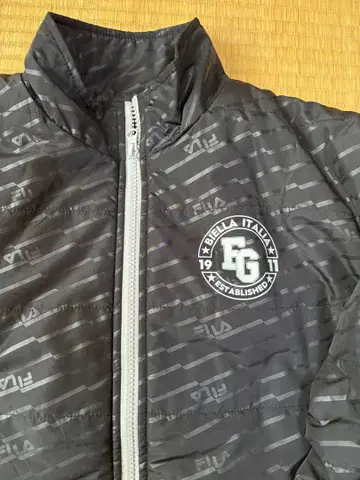 FILA 스트라이프 패턴 자켓