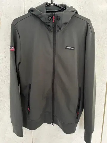 BRIEFING 후드 부착 그레이 자켓