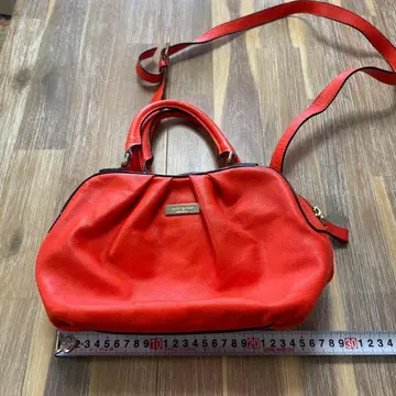 케이트 스페이드 오렌지 컬러 핸드백 도트 무늬