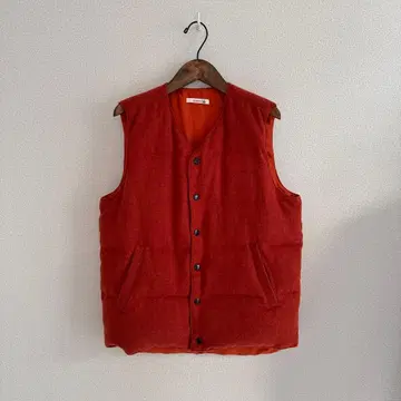 ETERNAL 오렌지 버튼 포함 다운 베스트