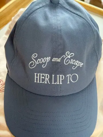 Her lip to Scoop and Escape Cap