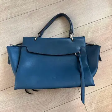 네이비 가죽 핸드백 story