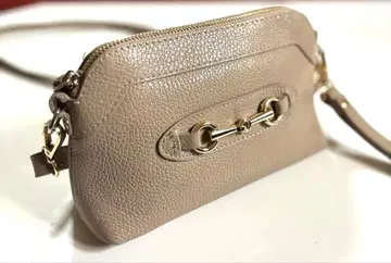 오우렌티 비트 장식 미니 숄더백 베이지