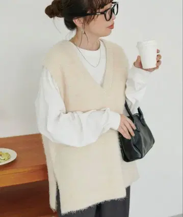 DISCOAT 페더얀 튜닉 베스트 아이보리