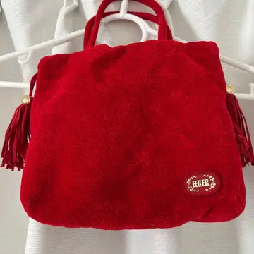 빨간색 프린지 장식 숄더백 7주년 기념