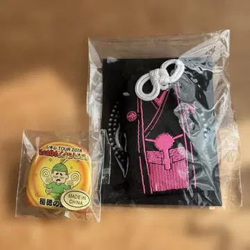 렉시 만만 일본 무키 이야기 핀 배지, 어나더 렉시 부적