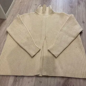 CLANE 울 혼방 하이넥 스웨터 아이보리