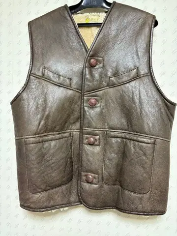 브라운 가죽 베스트 퍼 안감 부착