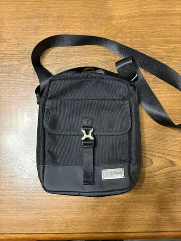 TRICKSTER 블랙 숄더백