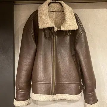 브라운 가죽 보아 옷깃 자켓