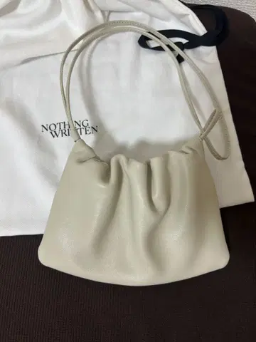 낫싱리튼 NELLA 스트랩 미니 백