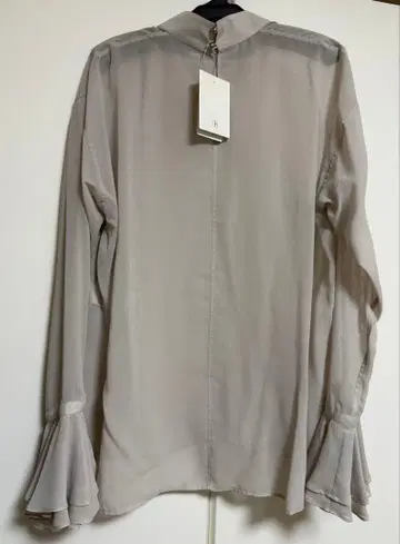 noble 더블 프릴 시어 블라우스