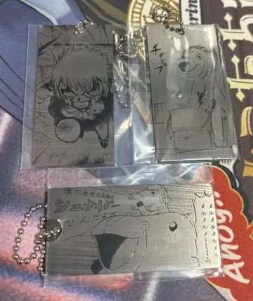 골드 컬러의 갓슈벨 제일복권 세트