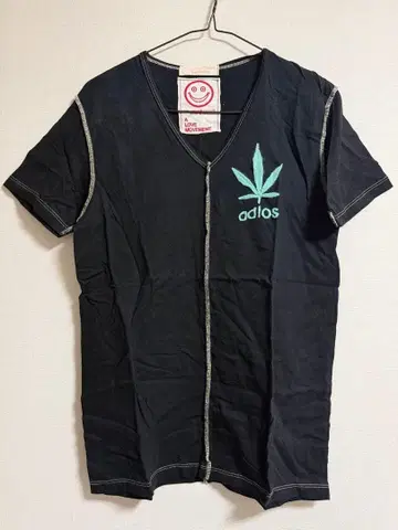 ALM A LOVE MOVEMENT 브이넥 티셔츠 오가즘 코튼