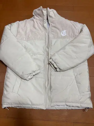 CRAMMY 크림색 다운 자켓