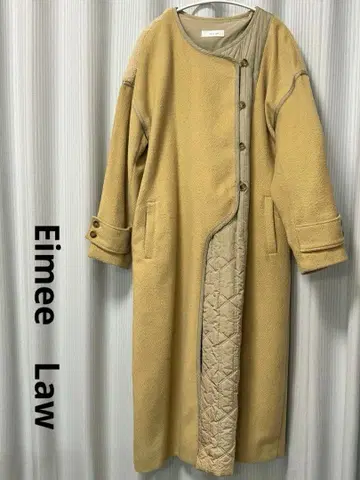 베이지 롱 코트 절개 디자인