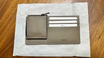 nunc 베이지 장지갑 소가죽