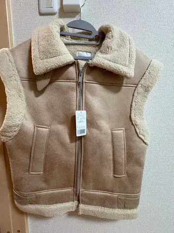 FAUX MOUTON VEST MILKFED.